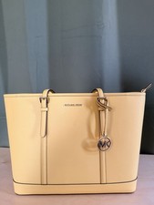 Michael Kors Yellow Zip Closure Logo Accent Bag Charm Tote Bag. LARGE.