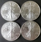 Lot of Four 2010 $1 American Silver Eagle Dollars