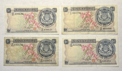 Lot Of 4 Singapore $1 Bills 1967 to 1972 in Protective Sleeves