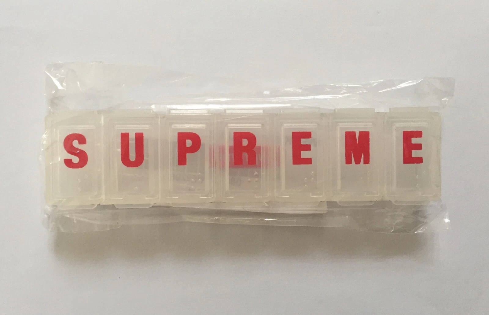 Boîte à pilules Supreme Weekday SS15 accessoires boîte logo BOGO rouge transparent pilulier