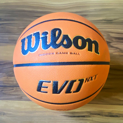 Wilson EVO NXT Orange Indoor Basketball Ball. Small black out of my number