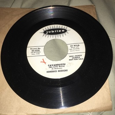 Domenico Modugno 45 7  Le Petit Reveil / Cavadduzzu Jubilee