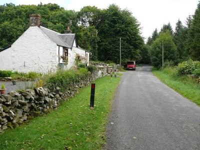 Photo A3 West Lodge Cottage Barrachan/NX3649 View of the cottage which  c2010