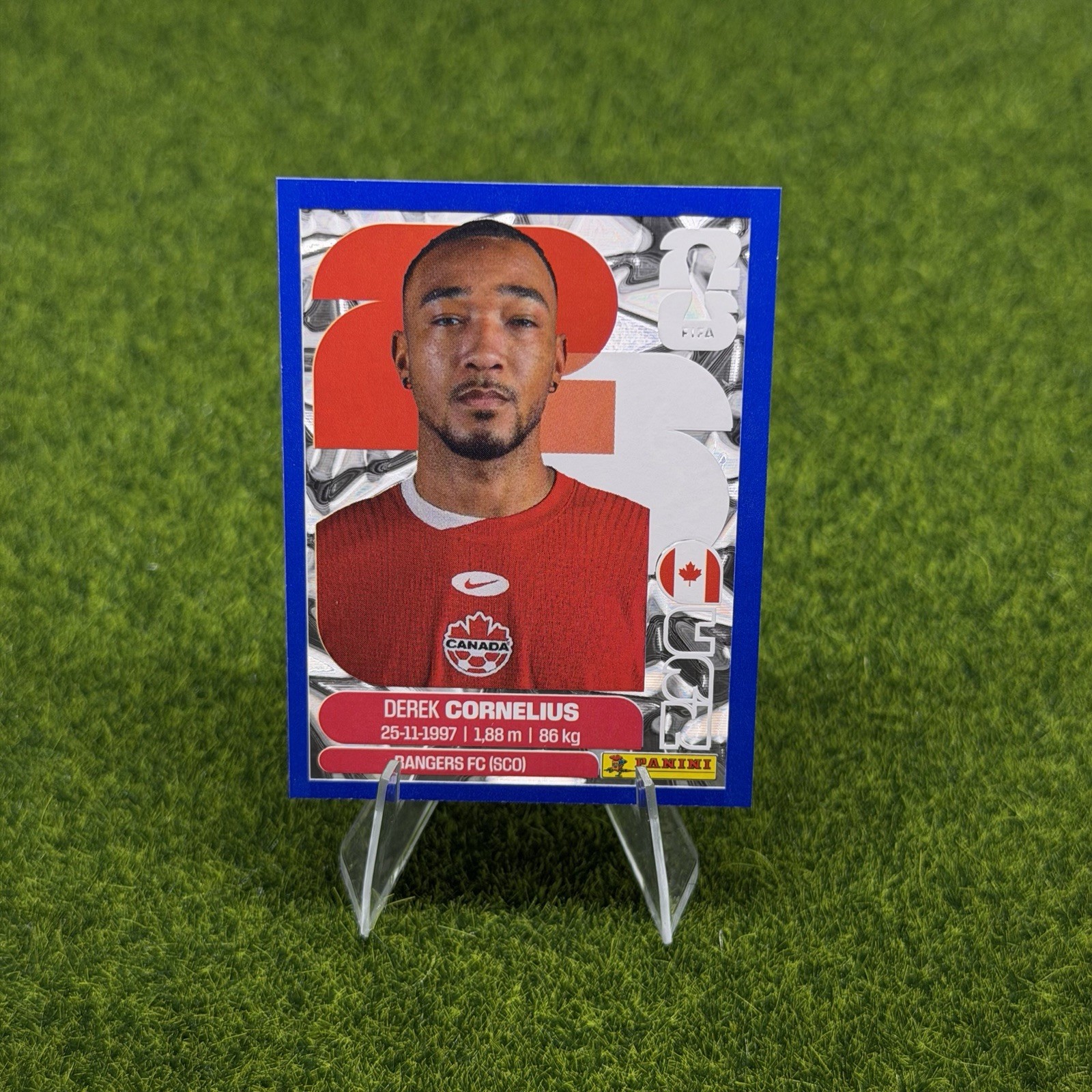 2026 Panini FIFA World Cup Sticker Blue Flood Crumple Derek Cornelius #CAN7