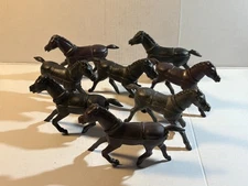 REL 60mm VTG soft plastic black wagon horses.  Eight total.  All in good shape.