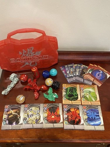 Lot of Bakugan 10 Brawlers, 7 Magnet Cards, 9 Booster Cards, Red Storage Case