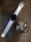 Samsung Galaxy Watch4 40 mm Silver Case with White Silicone Band... — photo 1