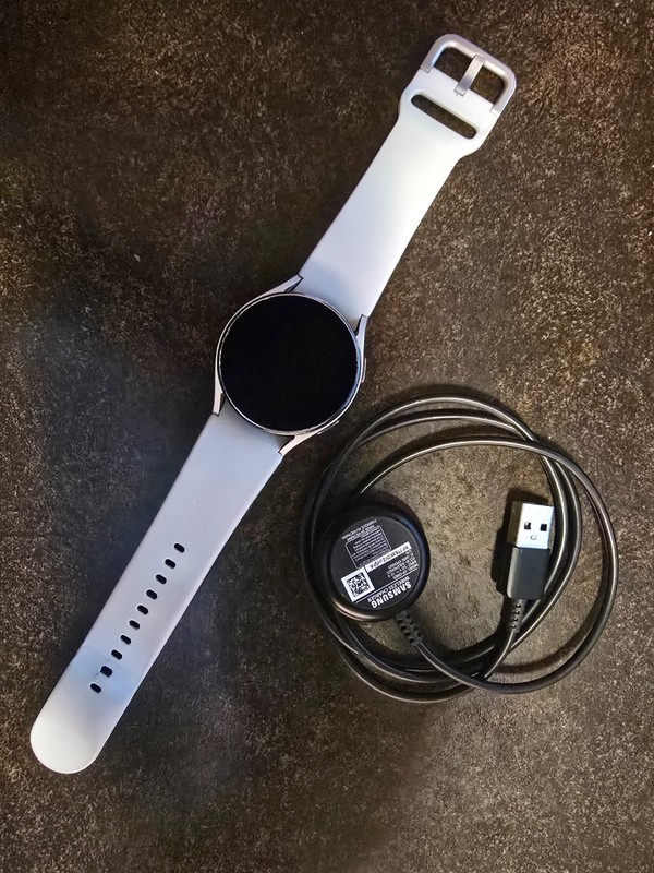 Samsung Galaxy Watch4 40 mm Silver Case with White Silicone Band...
