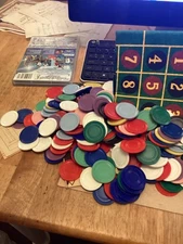 Collection of vtg plastic colorful poker chips,board instructions and old cards
