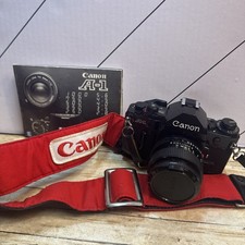 Vintage Canon A  1 camera With neck strap and instruction manual