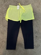 NWT Bebe Mesh Short Layer Capri Size S $69 Retail Price
