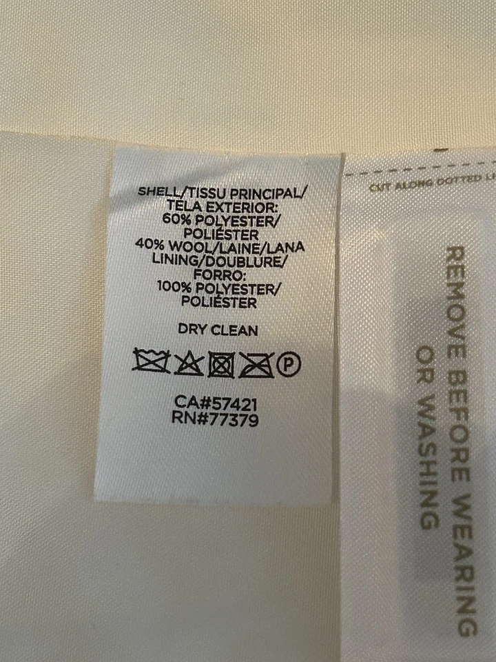 ¡Este es un impresionante abrigo de invierno blanco que te mantendrá caliente, acogedor y con estilo! Foto 3 de 4