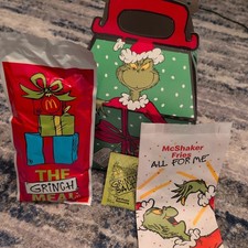 McDonald  s grinch socks unopened with pickle salt, shakeer bag and box