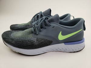 gray and black nike shoes