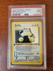1999 POKEMON JUNGLE 1ST EDITION #11 SNORLAX-HOLO PSA 9
