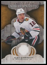 Alex DeBrincat - 2021-22 UD Artifacts NHL Remnants #NR-AD Chicago Blackhawks
