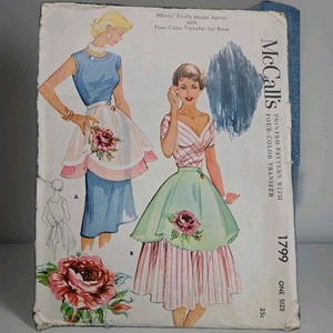 Vintage 1953 McCall's Apron Sewing Pattern With four Color Transfer Rose