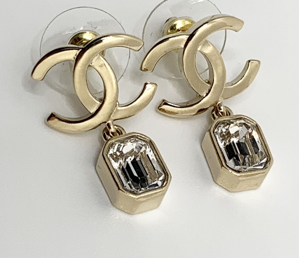 Authentic CHANEL CC gold earrings with dangling crystals