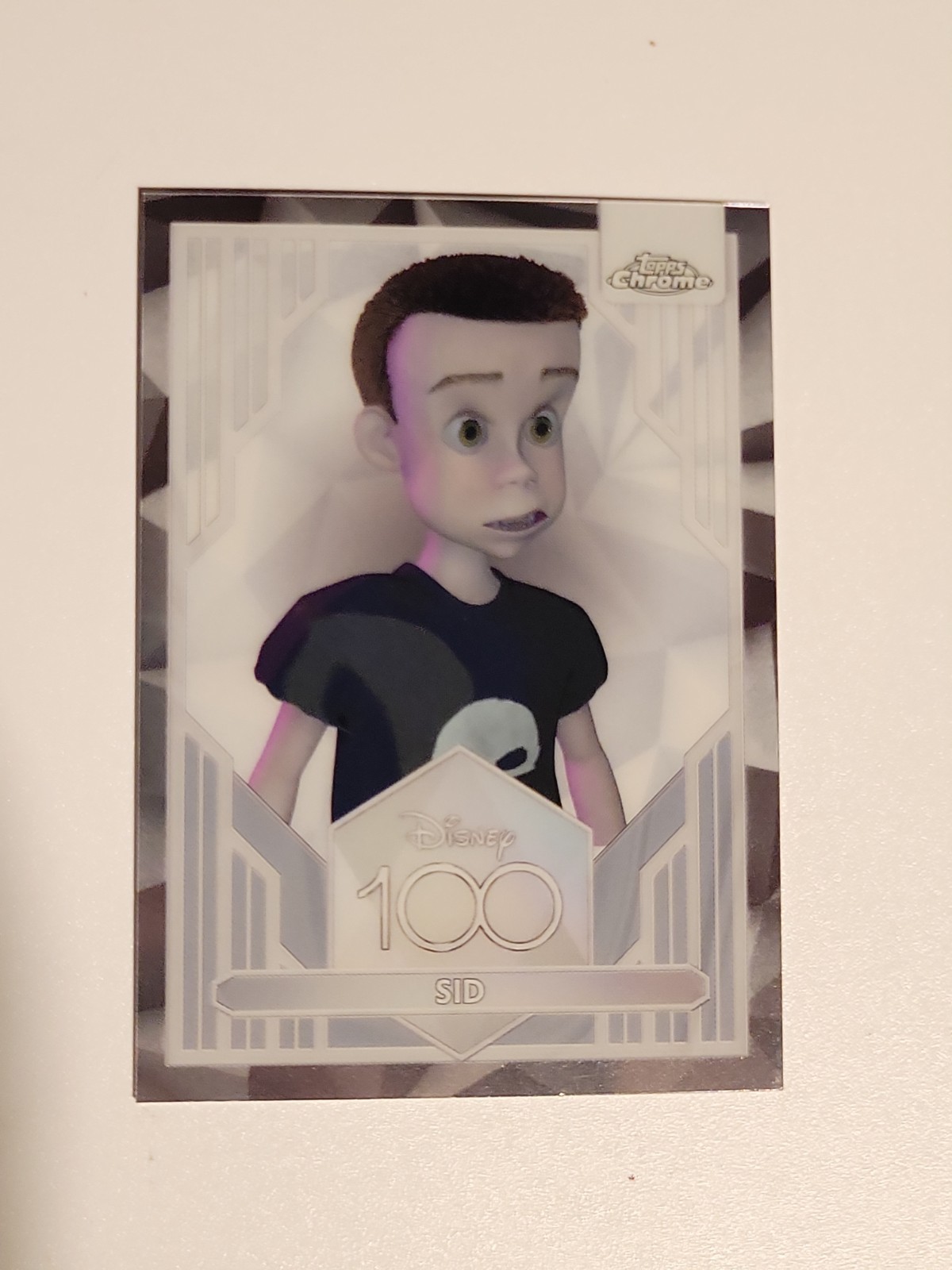 Sid #16 (2023 Topps Chrome Disney 100) — is it worth grading?