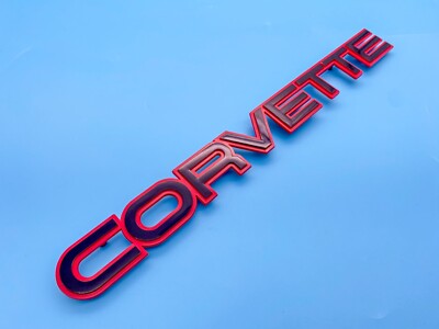 1x New For 84-1989 Chevrolet Corvette GM Rear Bumper Emblem 14064531（Black Red)