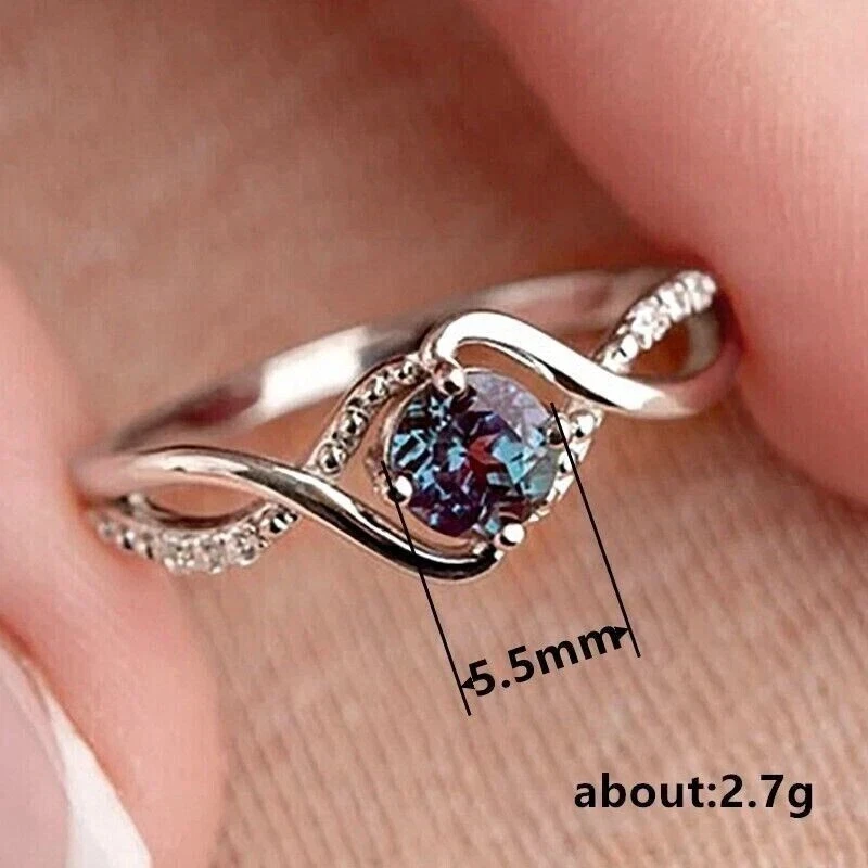 Anillo de compromiso redondo de derivación de alejandrita creado en laboratorio de 2 quilates enchapado en oro blanco de 14 quilates Foto 4 de 4