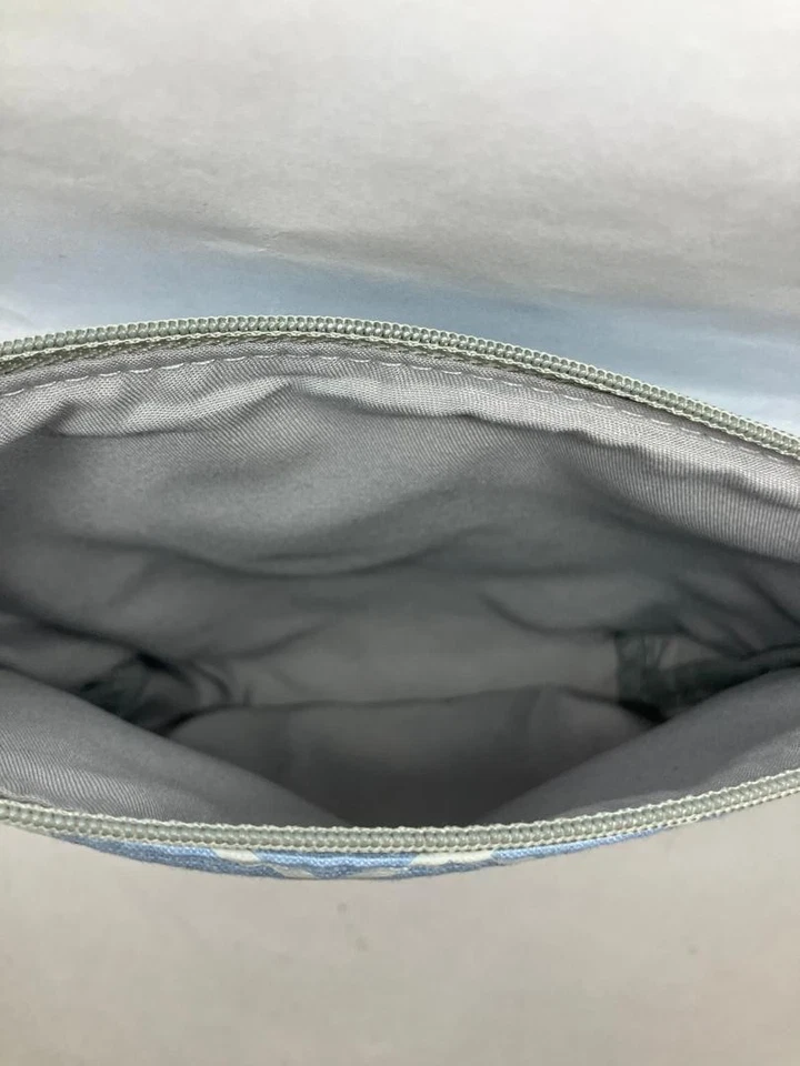 ANA Flight Collab Elegante Elegante Bolsa de Cosméticos de Maquillaje de Viaje Simple Azul Cielo Foto 3 de 4