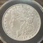 1887 Morgan Silver Dollar IN VERY GOOD CONDITION.
