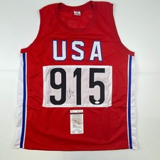 Maglia autografata/firmata Carl Lewis Track Stati Uniti USA Olimpiadi JSA COA