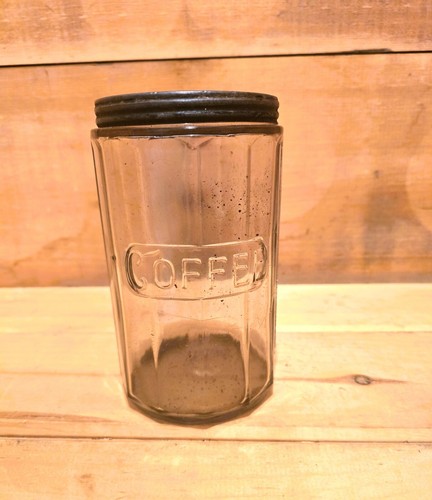 Hoosier Clear Glass Coffee Jar. 4-1/4"W x 7"H The Jar Is in Good Condition.