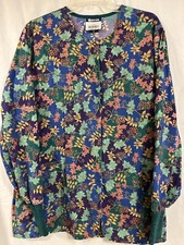 Long sleeve L scrub jacket. Dark green, purple, gold, berries/ leaf print.