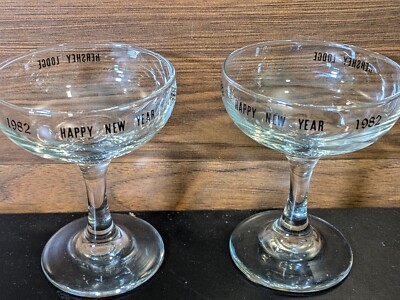 (2) 1982 Hershey Motor Lodge Happy New Year Champange Glasses