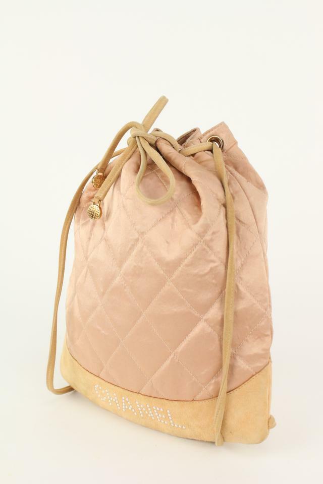 ゆ　　　CHANEL Chanel Pink Quilted Satin Crystal Logo Drawstring Backpack