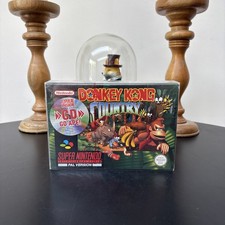 SNES donkey kong county factory sealed (damaged wrapping one end )