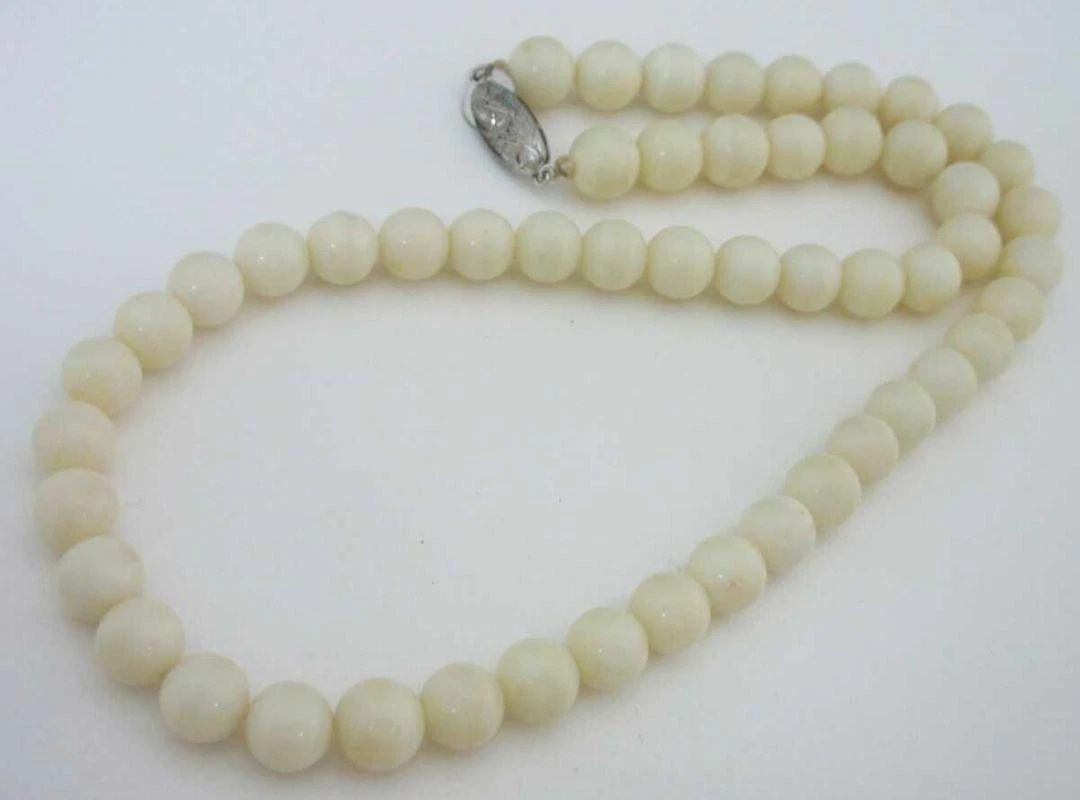 White coral best sale necklace