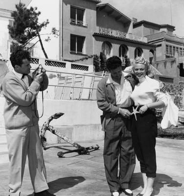 Carl Mohner and Diana Dors having their picture taken, at the C - 1954 Old Photo