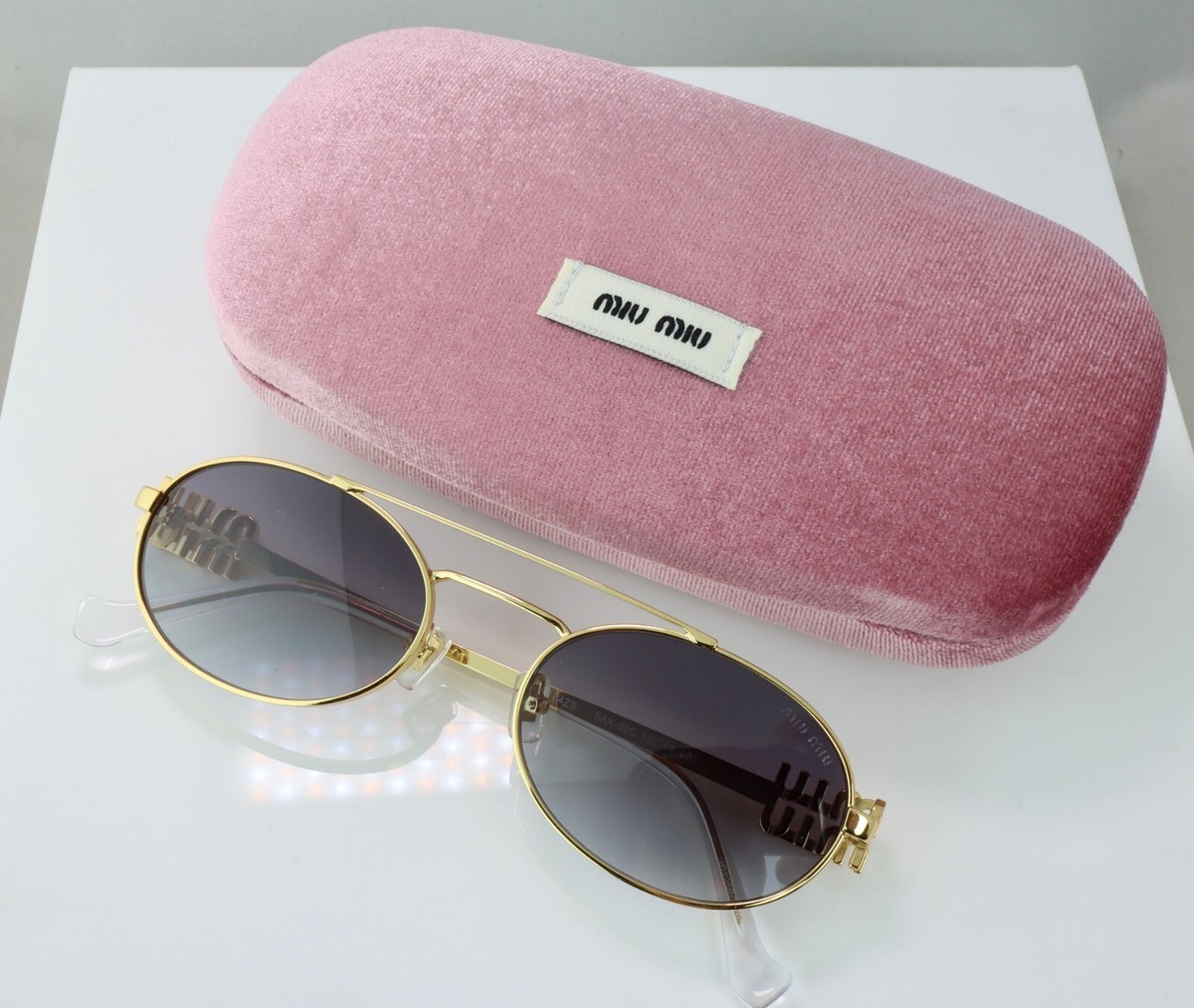 Miu Miu MU54ZS 53mm Logo Oval Sunglasses in Gold with Gray Lens | eBay