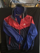 Nike Windrunner hooded windbreaker jacket featuring classic color-block design