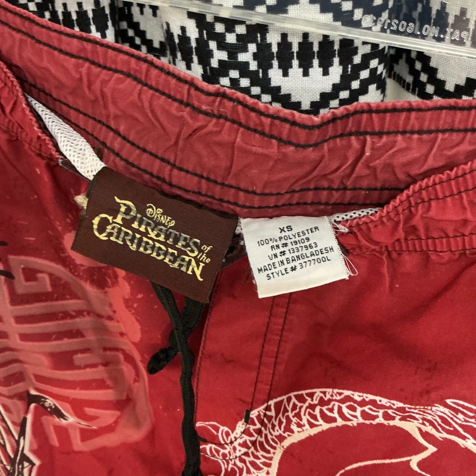 Disney Pirates of the Caribbean Swim Trunks Red Skull Dragon Sz XS - Image 2 of 3