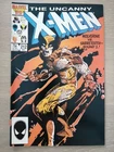 UNCANNY X-MEN #212_DECEMBER 1986_NEAR MINT MINUS_1st WOLVERINE Vs SABRETOOTH!