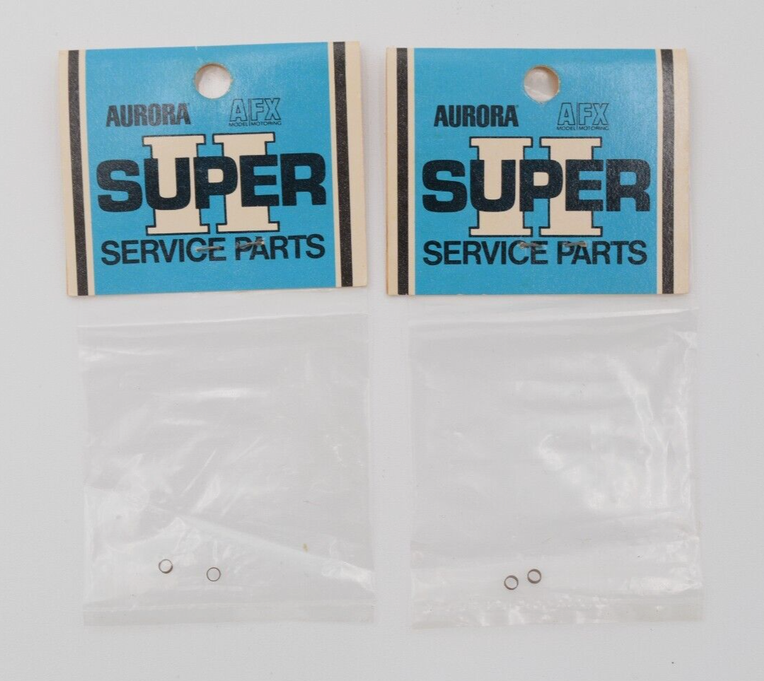 LOT OF 2 NOS AURORA AFX SUPER II COMMUTATOR BRUSH SPRINGS 855110 HO