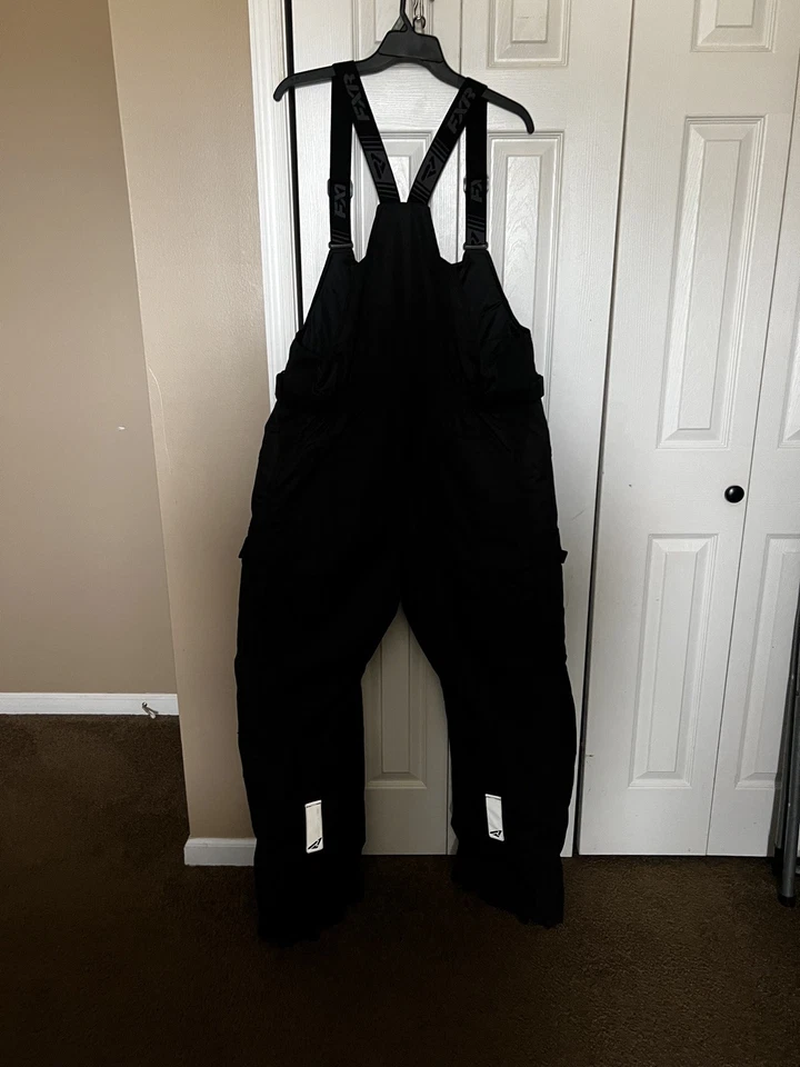 Baberos negros para moto de nieve FXR Excursion Foto 4 de 4