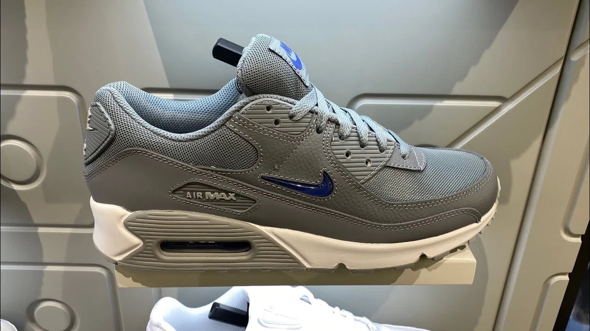 Grey nike shoes with cheap blue swoosh