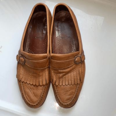 Allen Edmonds Woodville tan slip on loafers with fringe buckle