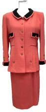 Chanel Couture Classic 2 pc suit  coral and black boucle wool with silk trim.