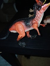 Carnotaurus action figure, which is part of the Jurassic World toy line.