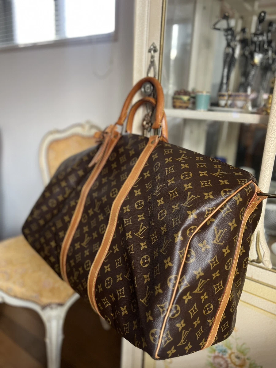 Louis Vuitton Monogram Canvas and Leather Keepall Bandouliere 55 bag