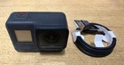 GoPro Hero 7 Black Works perfect average condition camera & cable only Awesome