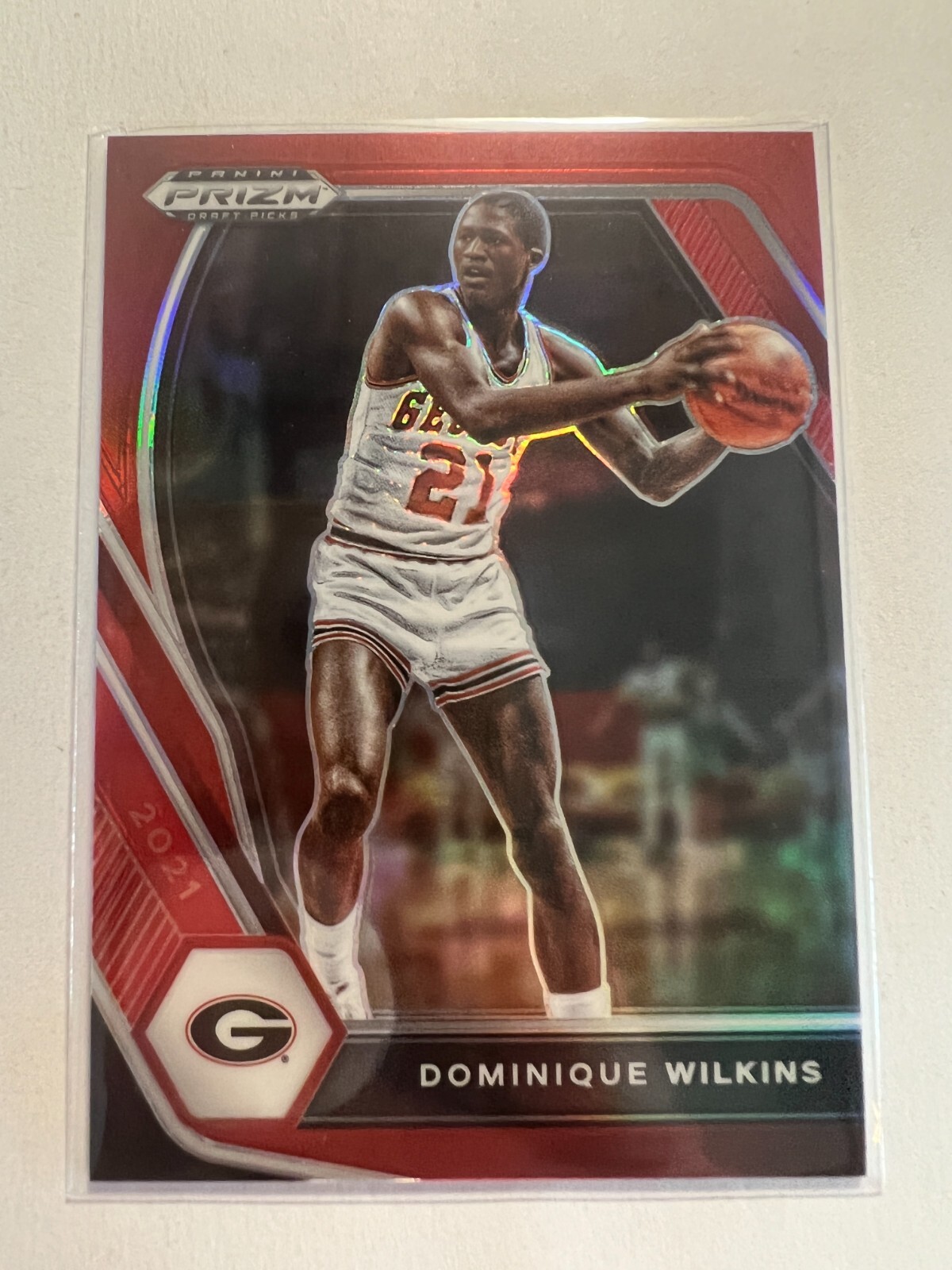 K8,953 - 2021-22 Panini Prizm Picks Prizms Red #93 Dominique Wilkins #/299