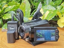 70567 Sony HDR-SR12 Camcorder Nightshot NTSC Tested w/ Charger Station