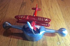 Model T Radiator cap (Dog Bone screw on type) with Hubley Style DieCast Biplane